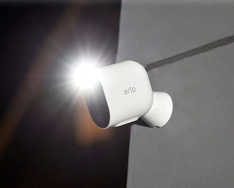 Arlo Pro 4 camera installed outdoors showing 2K HDR color night vision in action