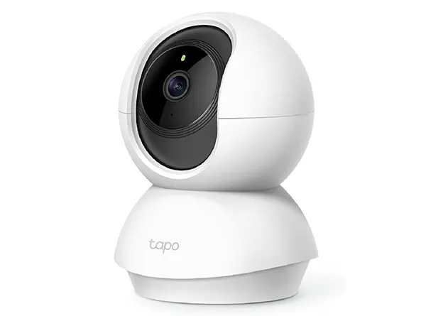 TP-Link Tapo C200 white pan tilt security camera on a table